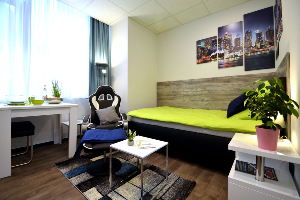 Serviced Apartment, Schlafzimmer mit Arbeitsplatz in Frankfurt Innenstadt