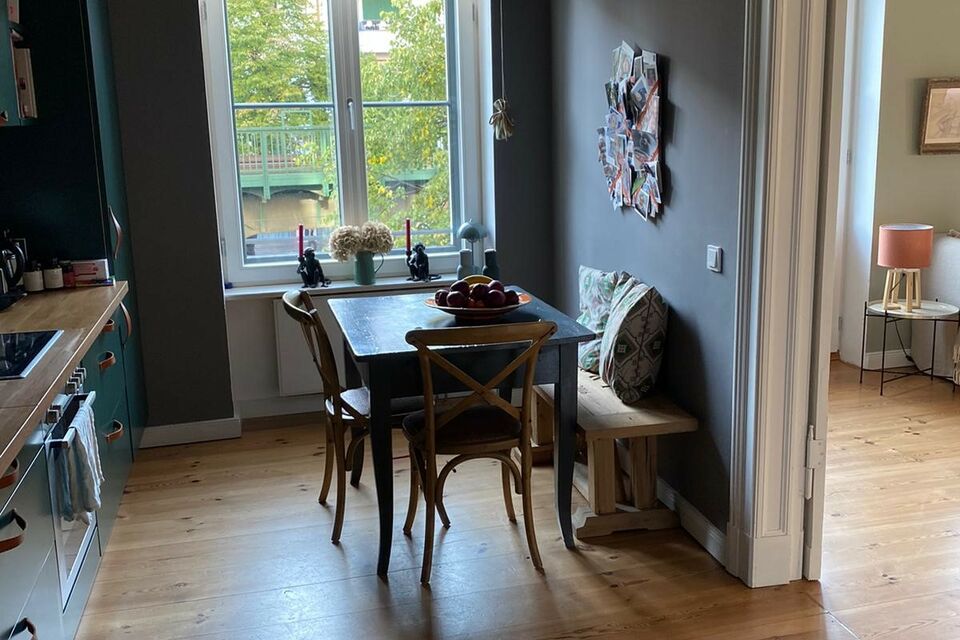 Apartment, dining room with large windows in Berlin Prenzlauer Berg