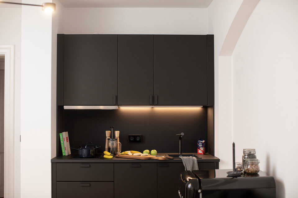 Furnished apartment, kitchen with LED task lighting in Berlin Mitte