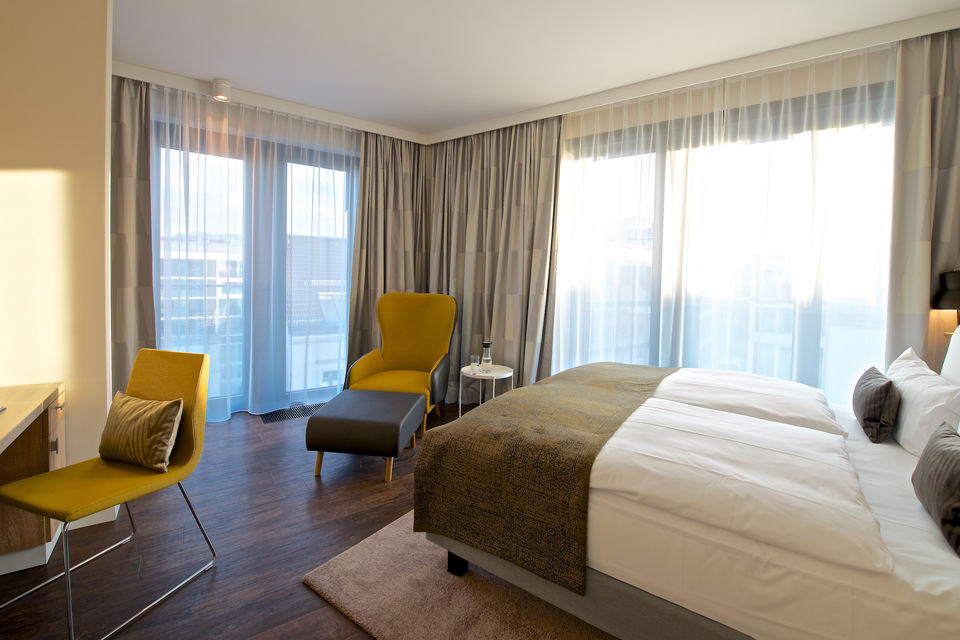 Serviced apartment, bedroom with panoramic windows in Berlin Mitte
