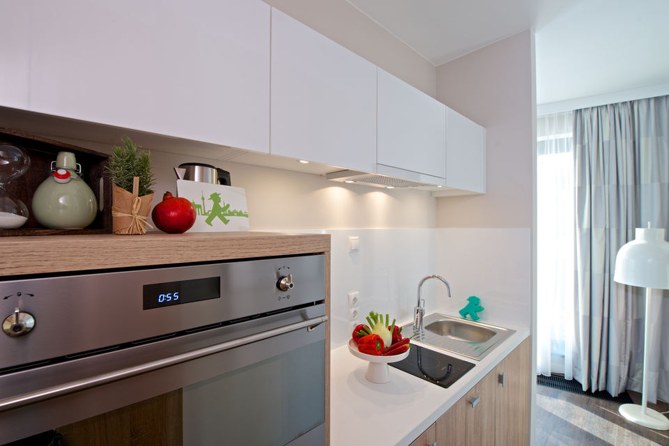 Serviced apartment, kitchen with modern built-in appliances in Berlin Mitte