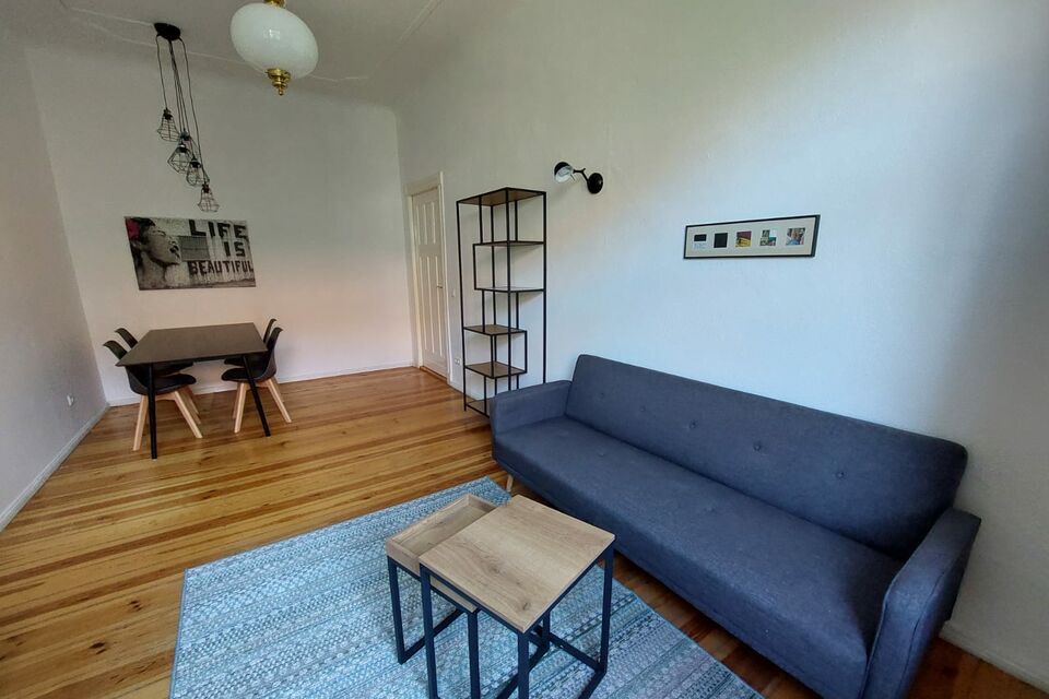 Furnished apartment, living room with wooden flooring in Berlin Neukölln