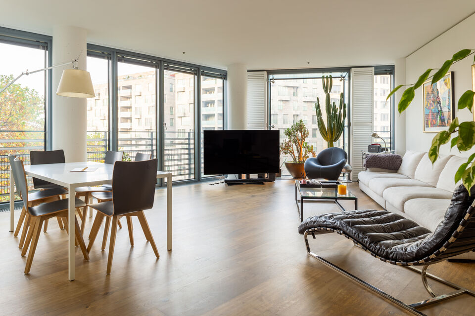 Furnished apartment, living room with panoramic windows in Berlin Mitte
