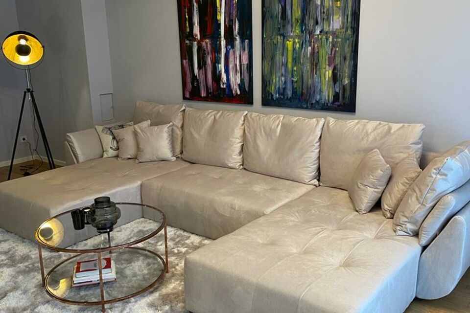 Furnished apartment, living room with corner sofa in Berlin Mitte