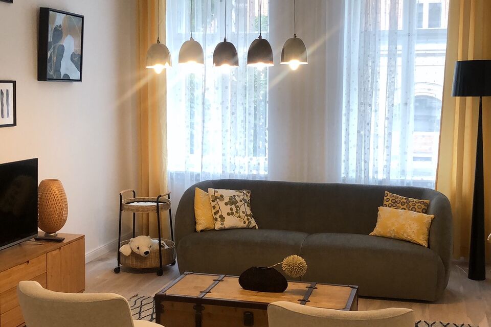 Furnished apartment, living room with pendant lights in Berlin Mitte