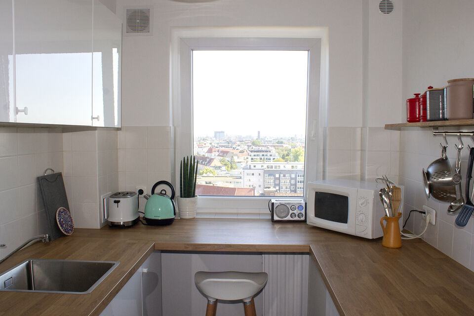 Furnished apartment, kitchen with panoramic window in Berlin Wilmersdorf