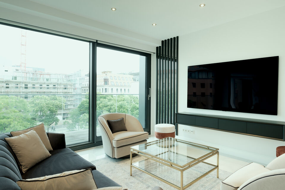 Furnished apartment, living room with panoramic windows in Berlin Mitte