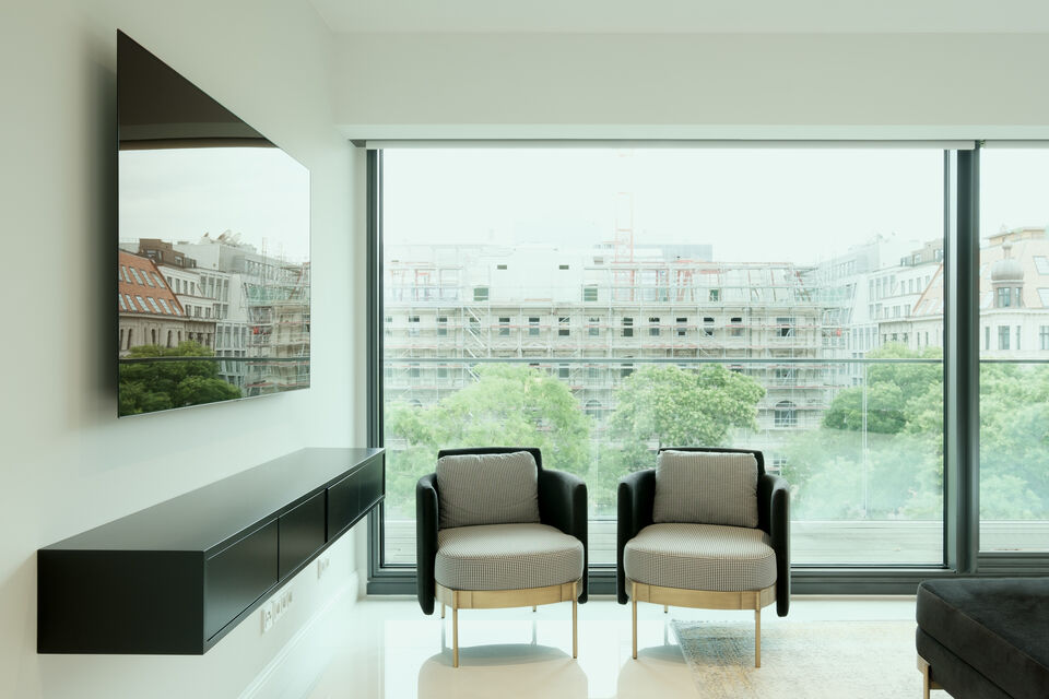 Furnished apartment, living room with panoramic windows in Berlin Mitte