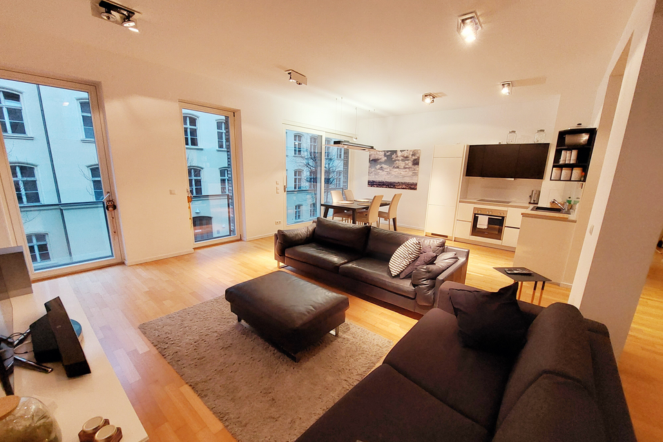 Furnished apartment, living room with panoramic windows in Berlin Mitte