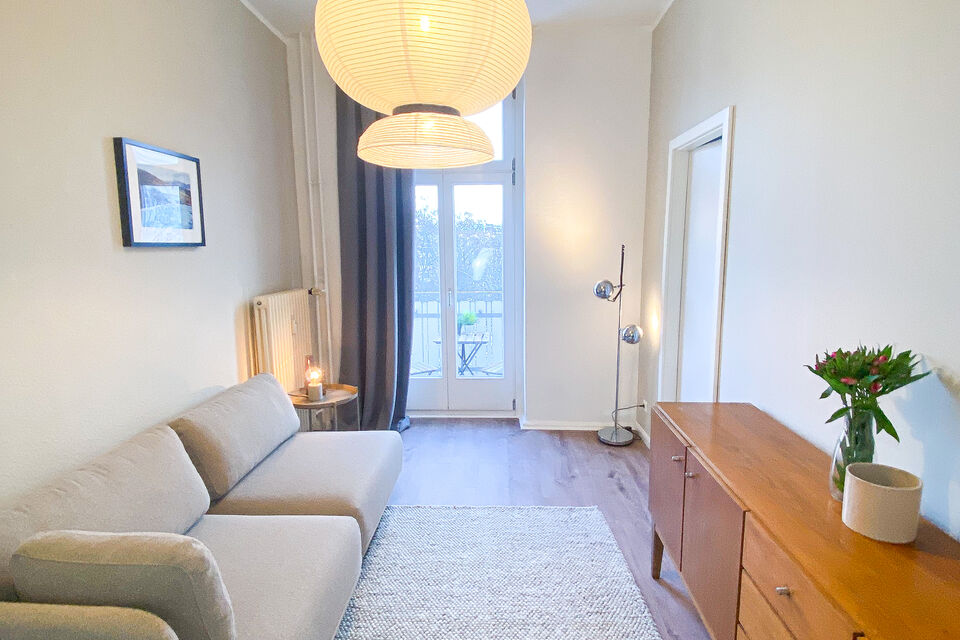 Furnished apartment, living room with pendant lights in Berlin Friedrichshain