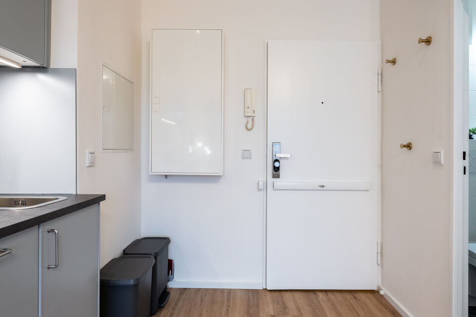 Furnished apartment, kitchen with white built-in appliances in Berlin Charlottenburg