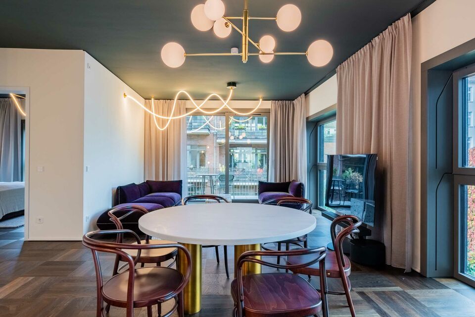 Furnished apartment, dining room with designer pendant light in Berlin Prenzlauer Berg