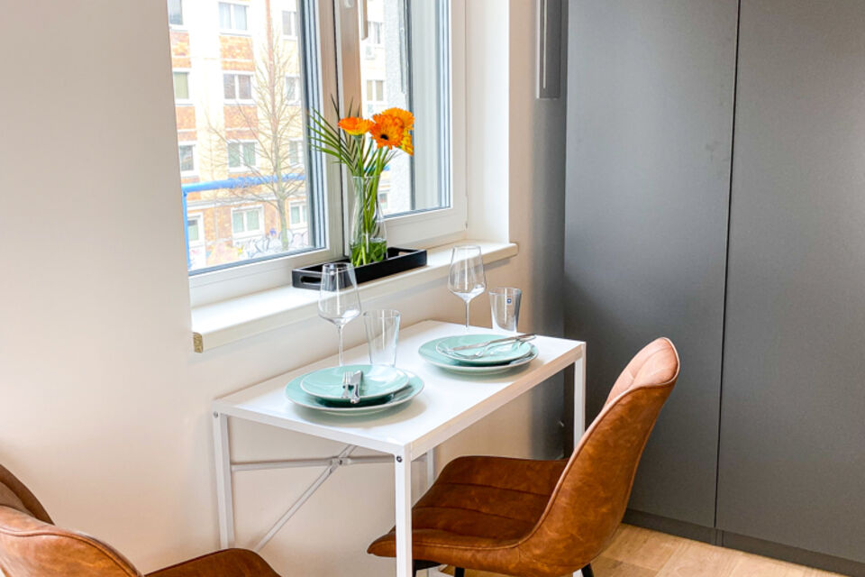 Furnished apartment, dining room with window view in Berlin Friedrichshain