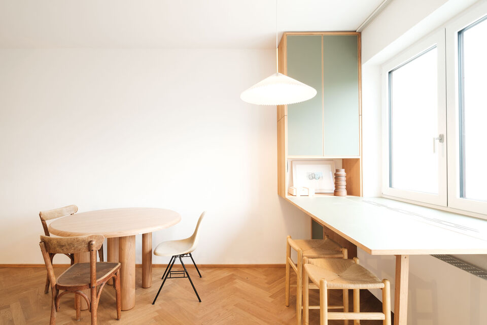 Furnished apartment, dining room with wooden furniture in Berlin Kreuzberg