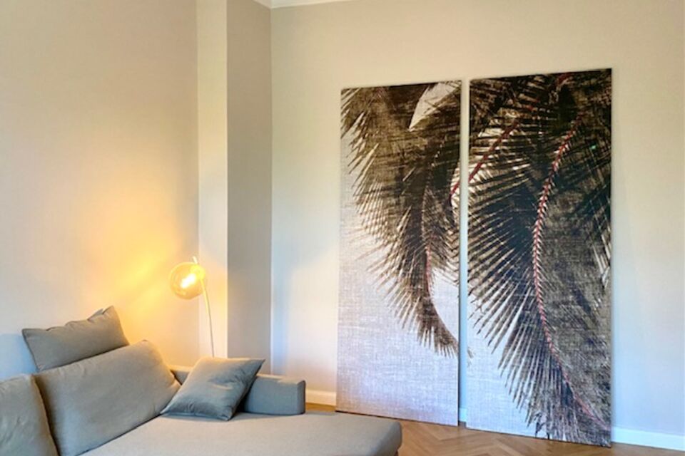 Furnished apartment, living room with palm leaf artwork in Berlin Prenzlauer Berg