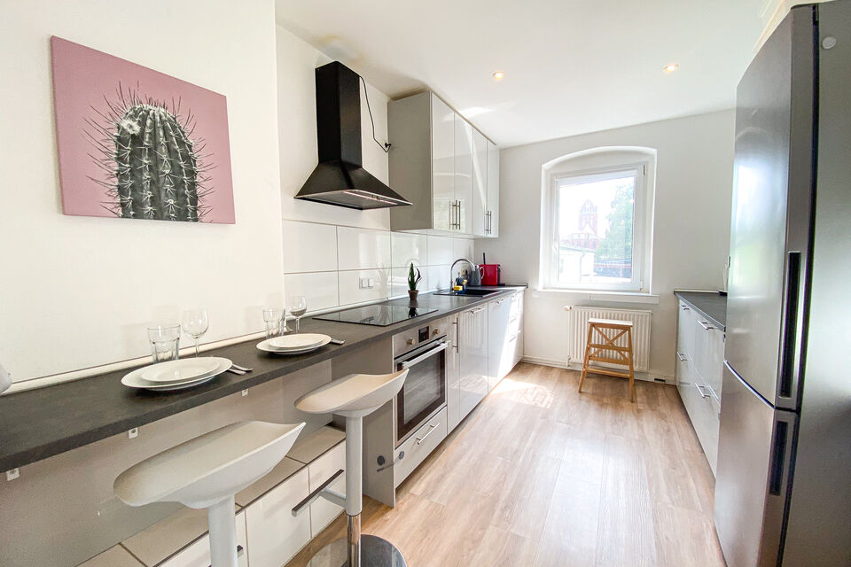 Furnished apartment, kitchen with pass-through to living area in Berlin Weißensee
