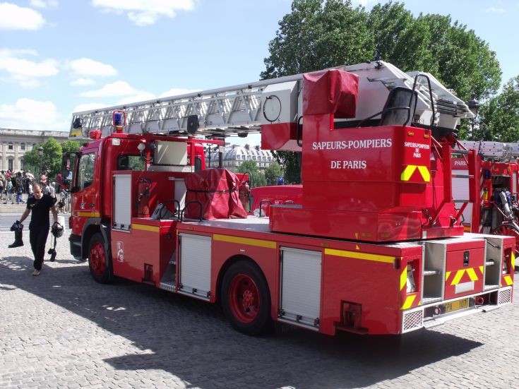 Paris firemen ladder close to the river Seine.