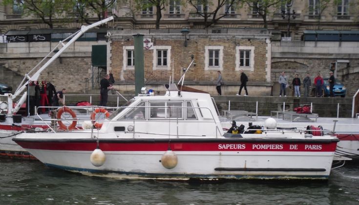 Firemen boat on the river Seine.