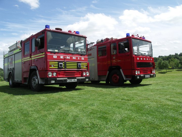 Two sister Watford Dennis machines out in the sun