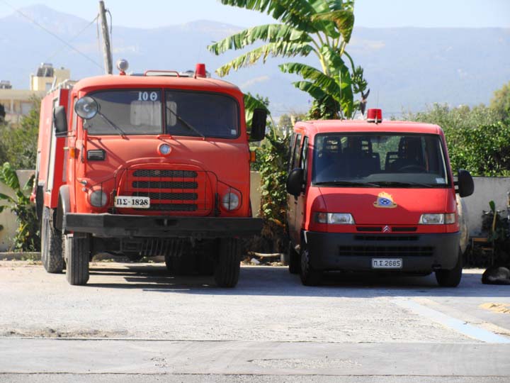 Two vehicles outside Fire station city of Kos 