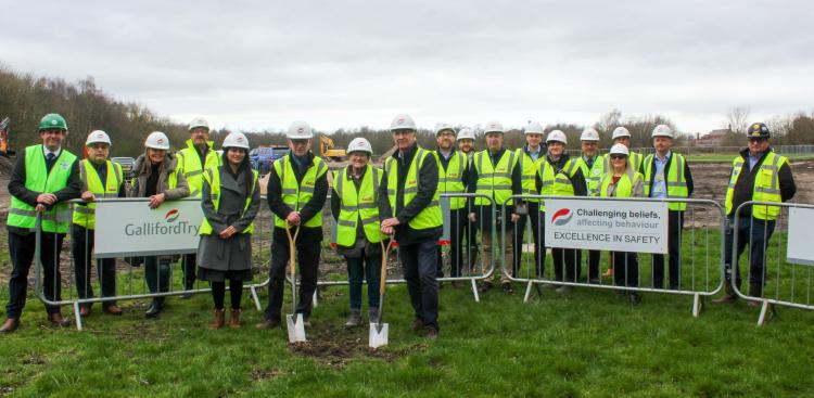 Stakeholders across the partnership break ground at one of two Wigan community hub sites