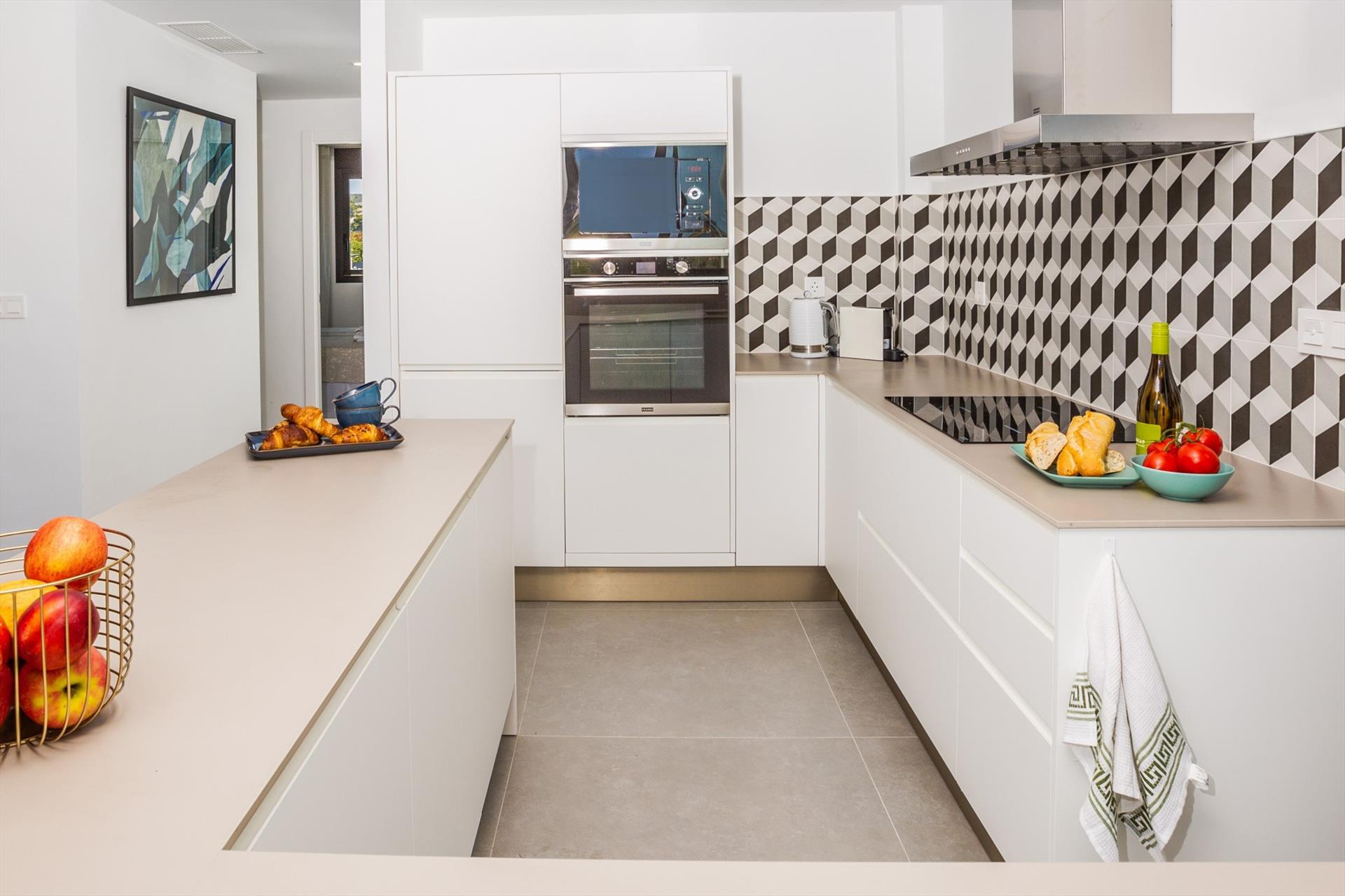 Kitchen facilities at Arenal Playa II in Spain