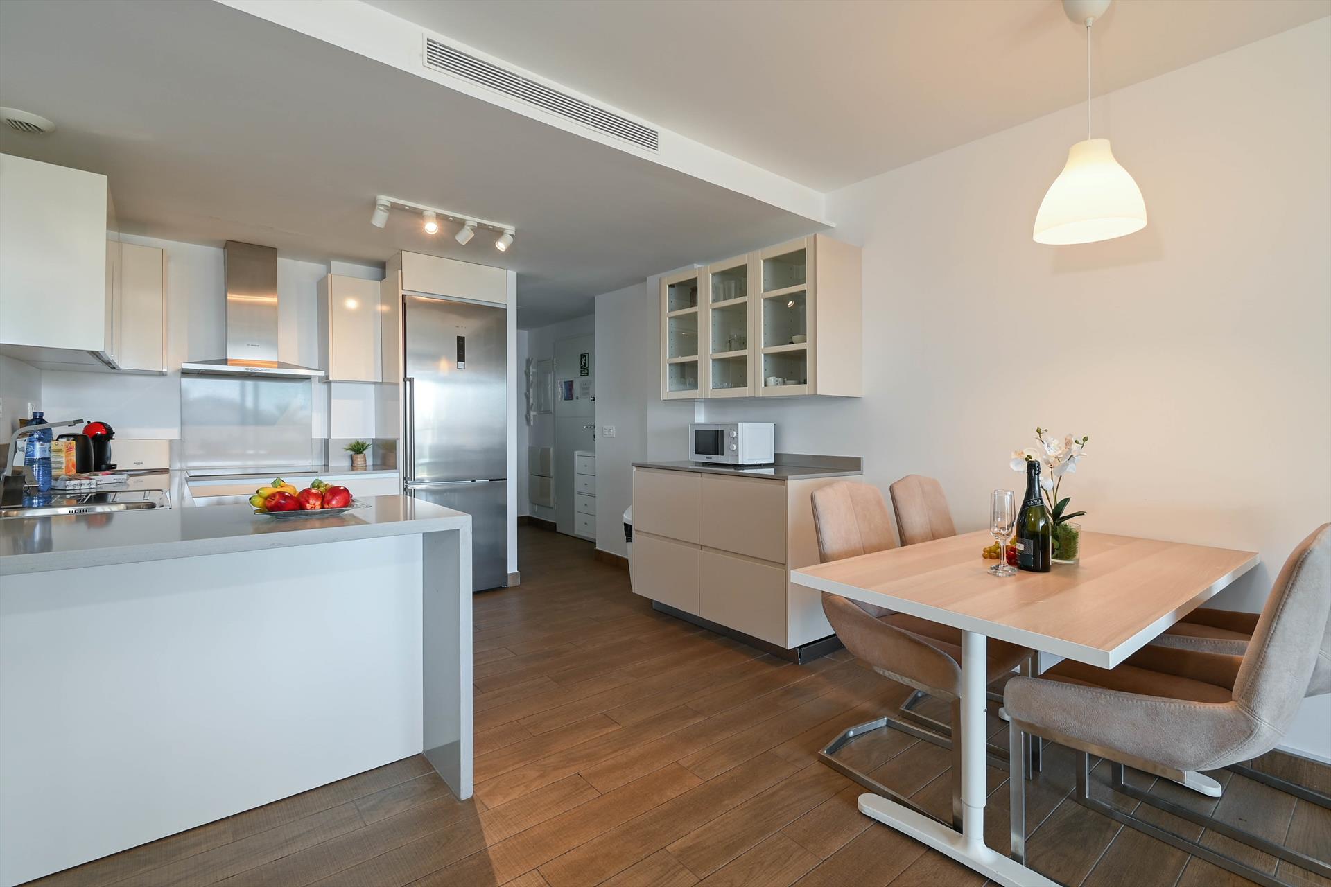 Kitchen facilities at Jardines del Mar in Spain