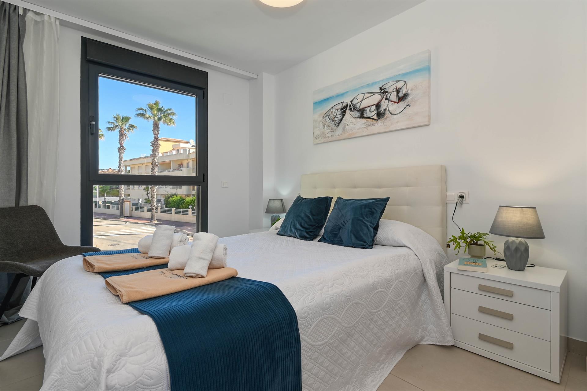 Outdoor terrace and garden at Brisa Marina II in Spain