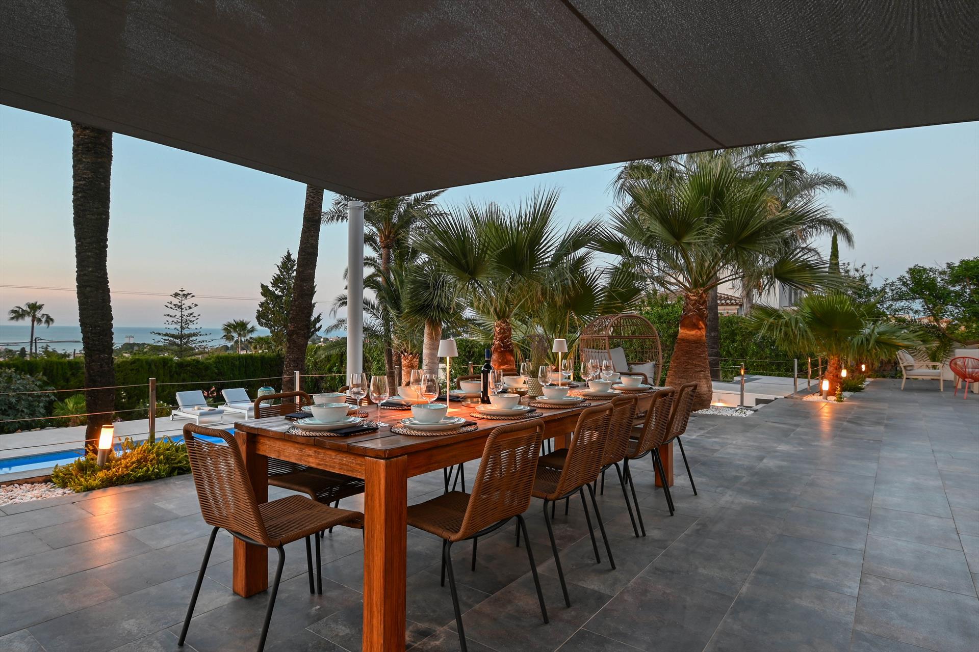 Outdoor terrace and garden at Villa Amantos in Spain