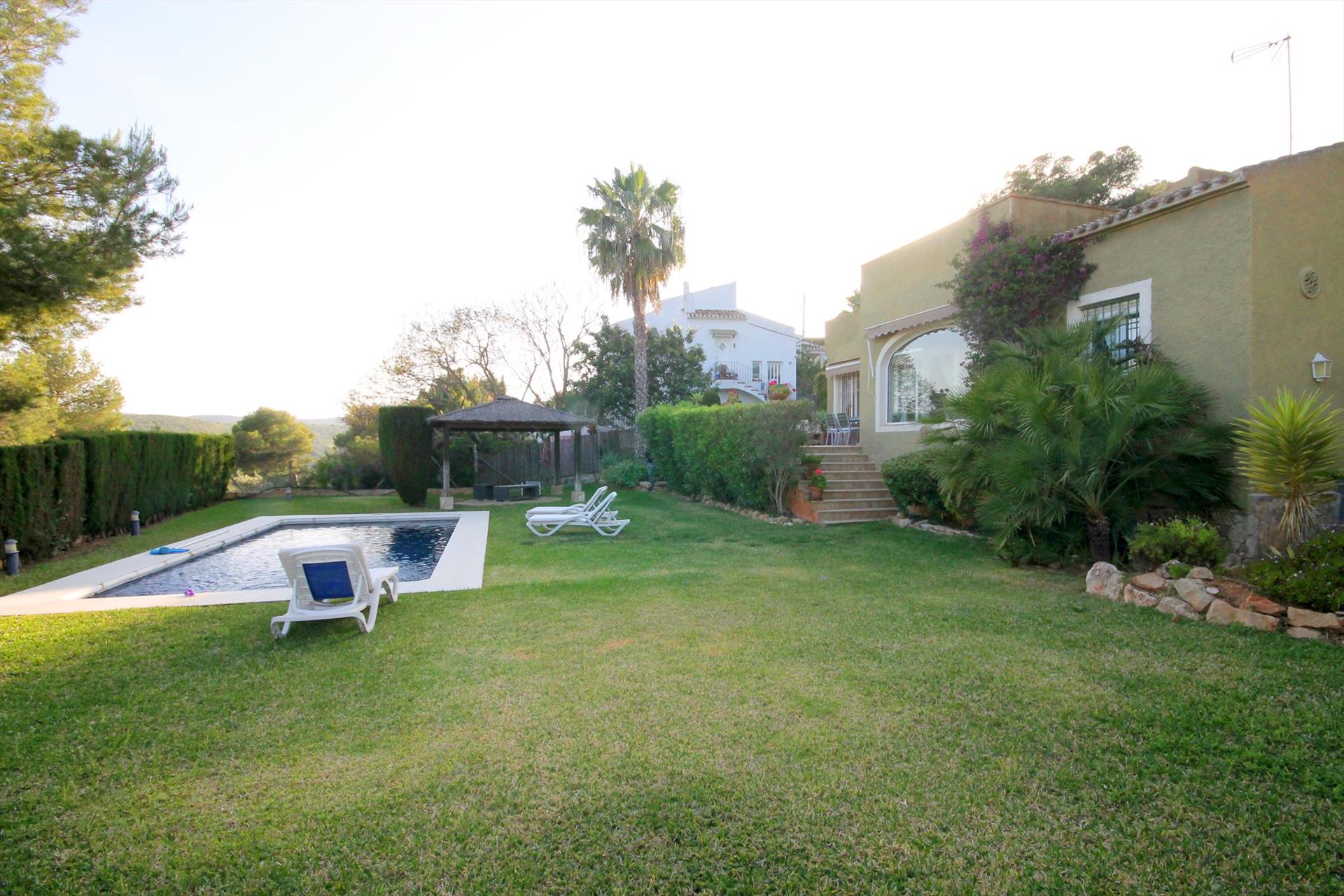 Outdoor terrace and garden at DENVER in Spain