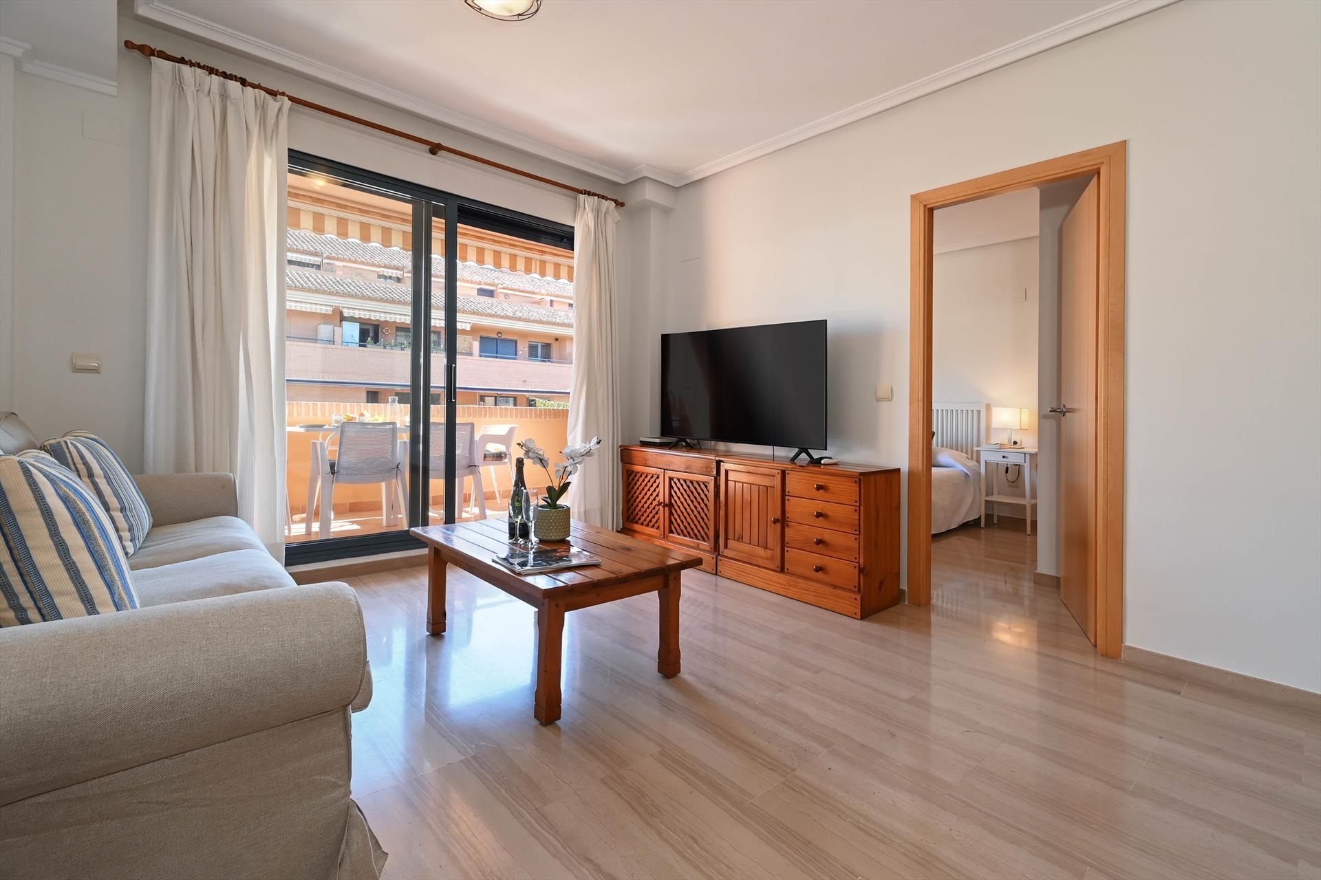 Interior living area at Jardines del Pueblo in Spain