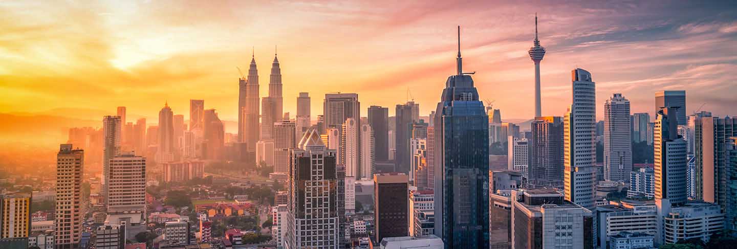 Kuala lumpur skyline and skyscraper with highway road Premium Photo