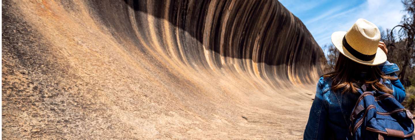 Lady backpack travel in wave rock