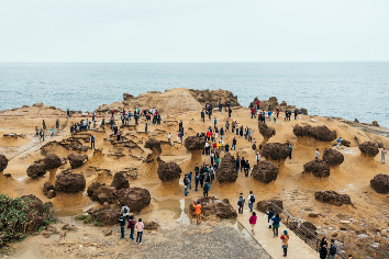 Diversity of tourists walking in yehliu geopark, a cape on the north coast of taiwan