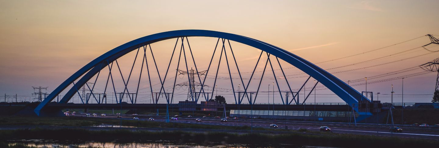 Sunset bridge over the road.