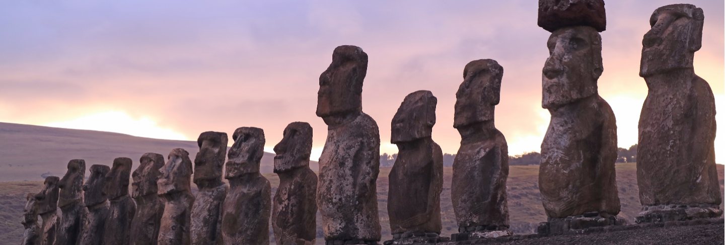 Gigantic 15 moai statues of ahu tongariki against beautiful sunrise cloudy sky, easter island, chile