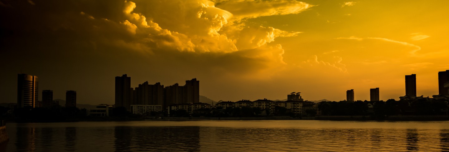 Sunset with city