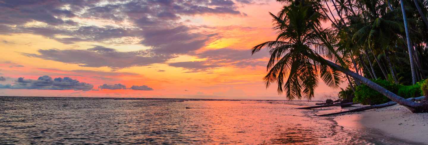 Sunset dramatic sky on sea, tropical desert beach