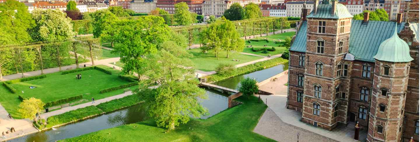 Aerial view of rosenborg slot castle and beautiful garden from above, kongens have park in copenhagen, denmark