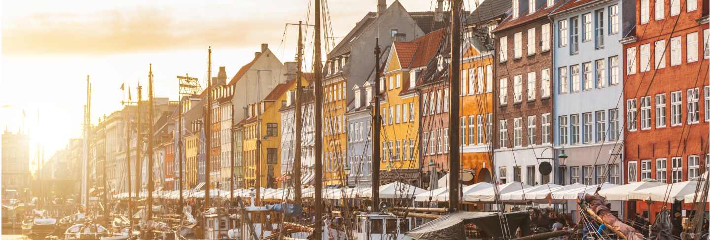 Colorful houses in copenhagen old town at sunset