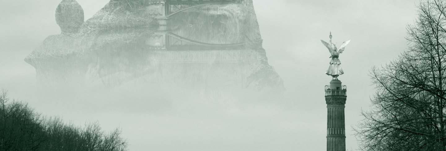 Beautiful shot of a large stone monument surrounded by fog