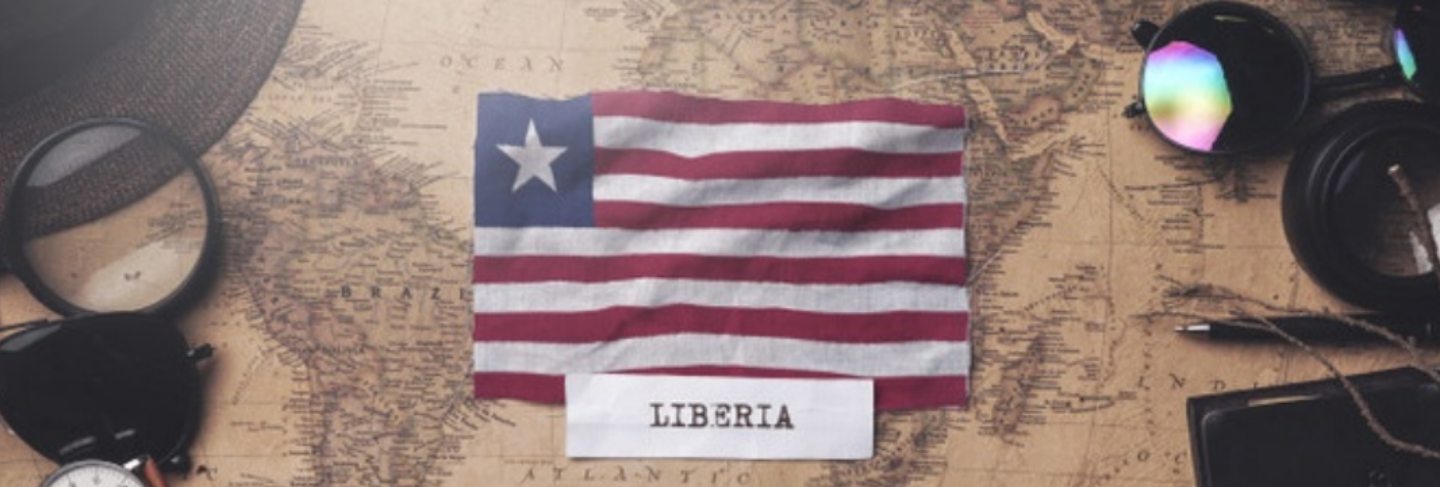 liberia-flag-traveler-s-accessories-old-vintage-map-overhead-shot_1379-3968
