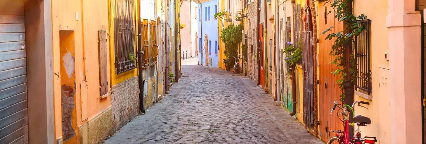 San giuliano narrow street with a bicycle in rimini, italy