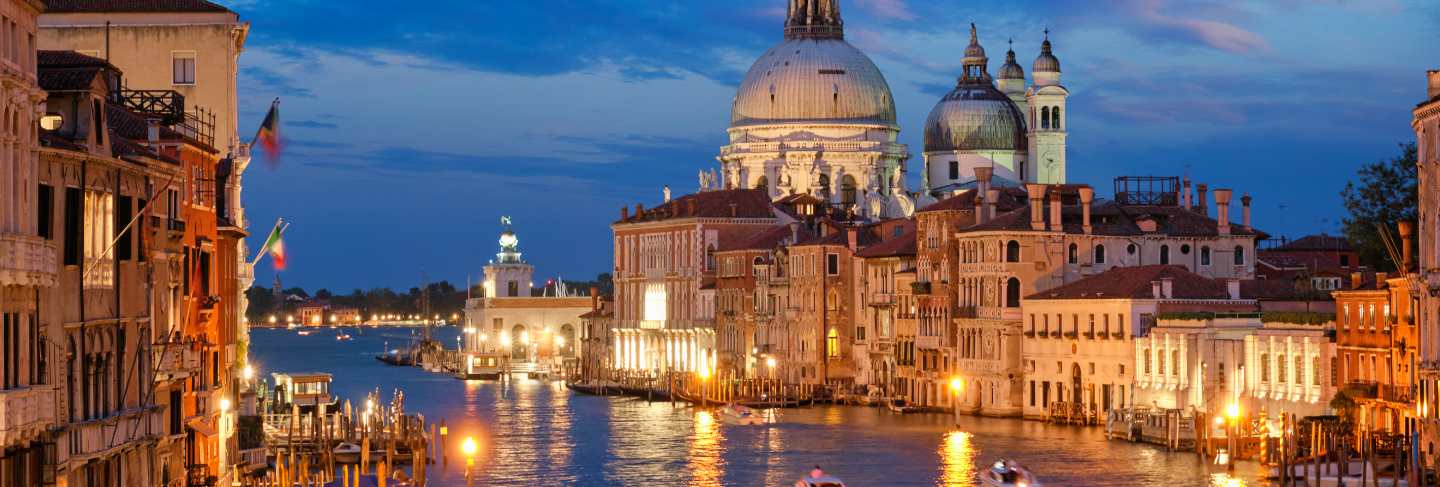 View of venice grand canal and santa maria della salute church in the evening