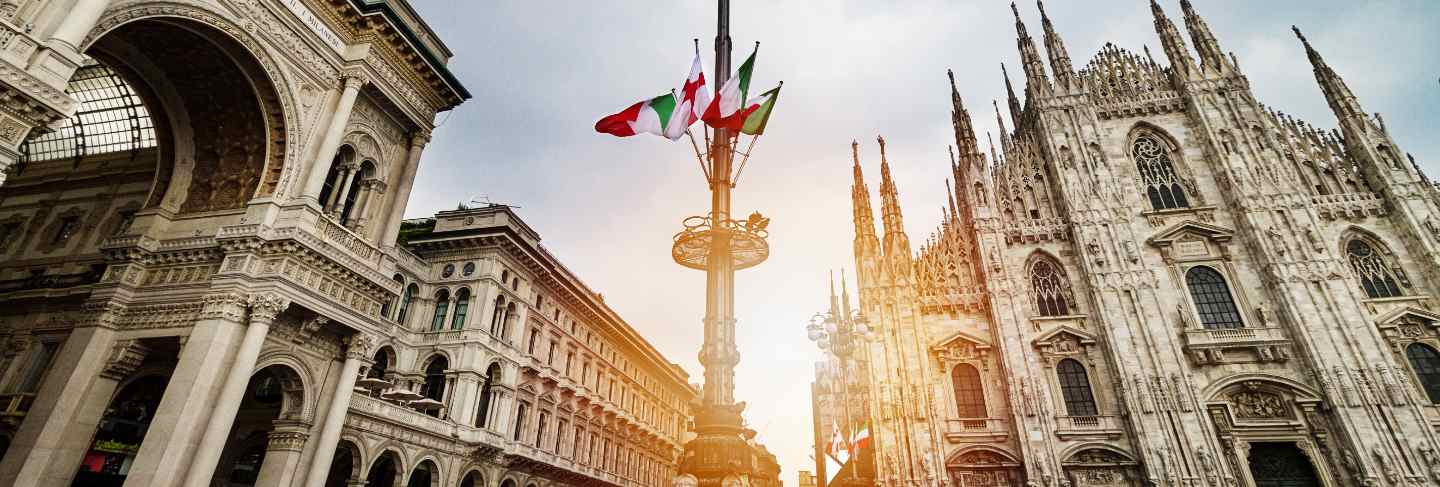 Beautiful panoramic view of duomo square in milan with big street