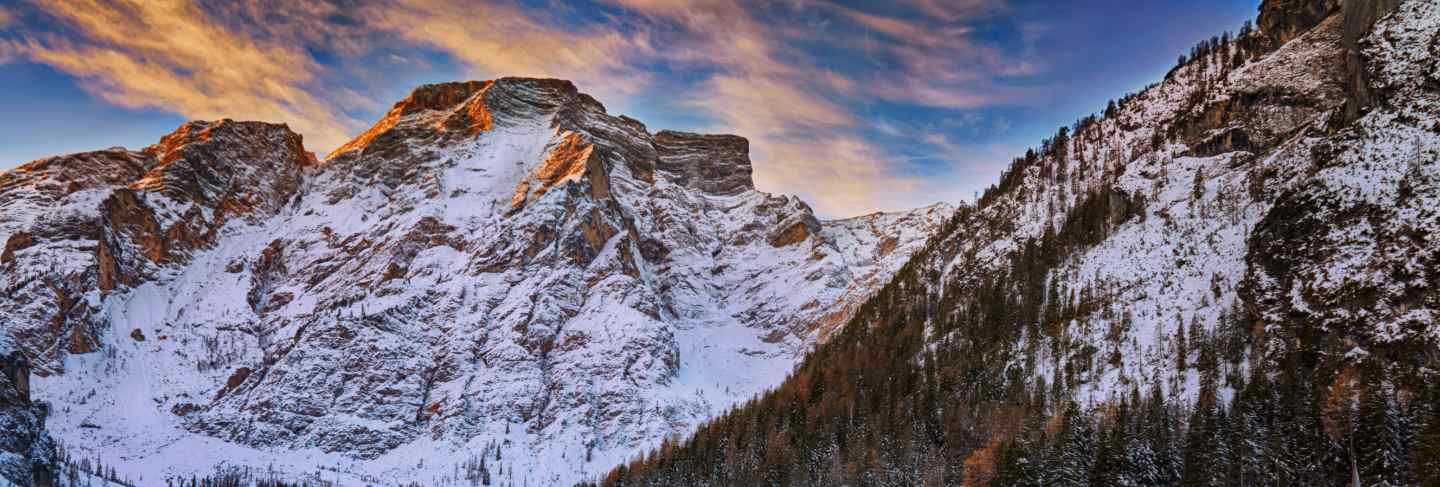 Winter sunrise over lago di braies, dolomites, italy