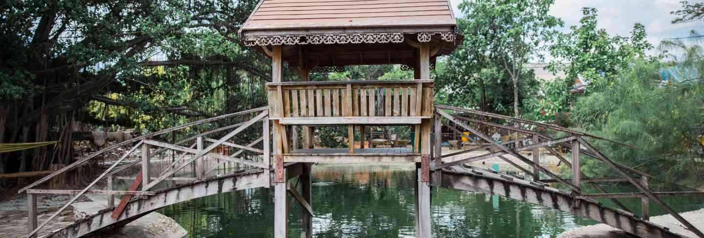 Wooden bridge across the river