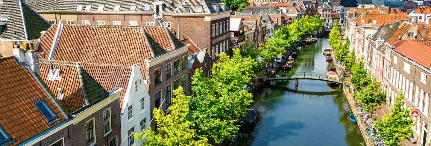 Aerial drone view of leiden town cityscape from above, typical dutch city skyline with canals and houses, holland, netherlands