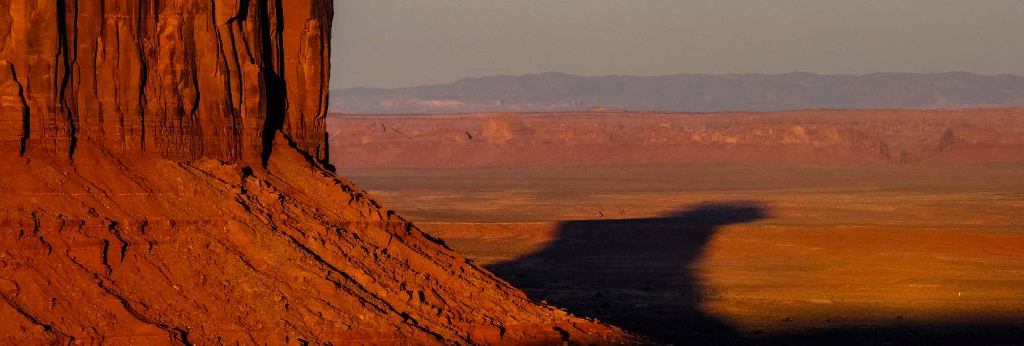 Beautiful shot of a desert and big cliff on a sunny day