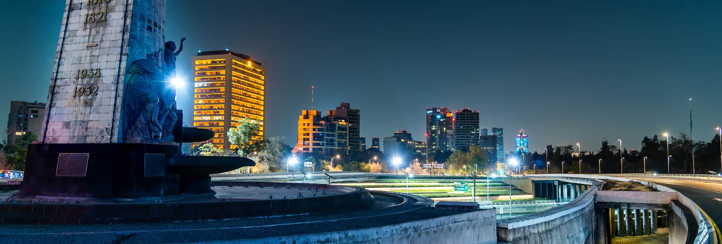 Mexico city night landscape, petroleum fountain and periferico highway
